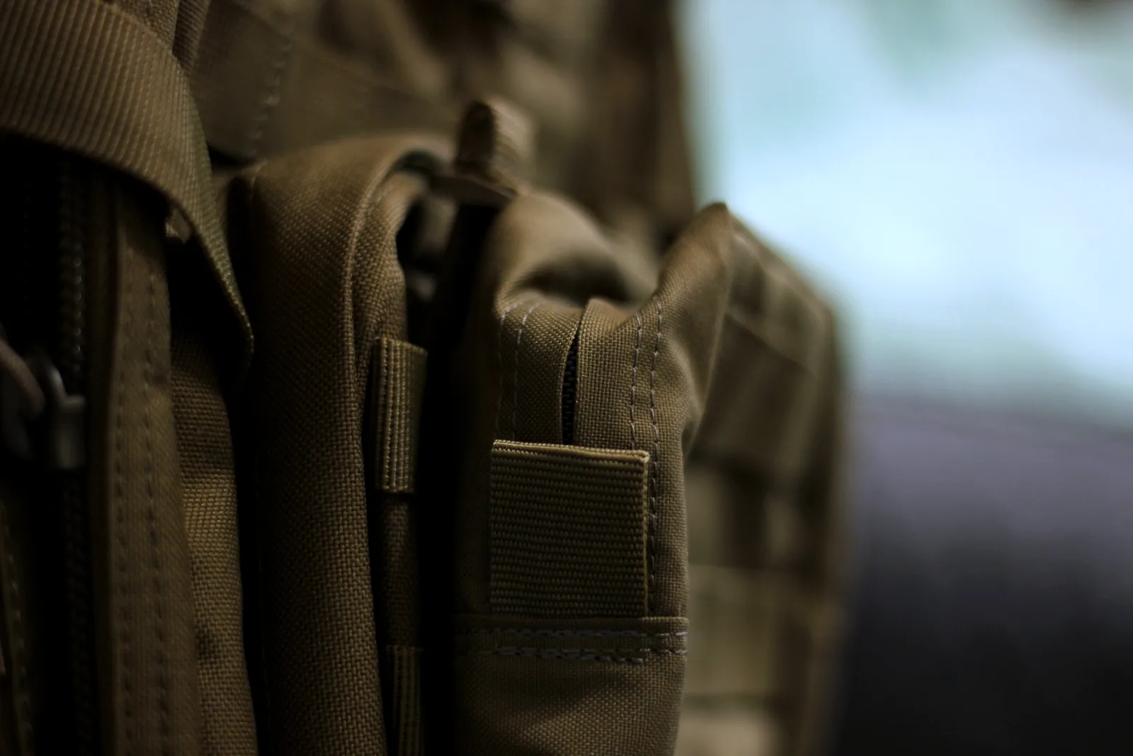 The 6.6 pouch mounted onto the MOLLE on the front of the RUSH 12 pack