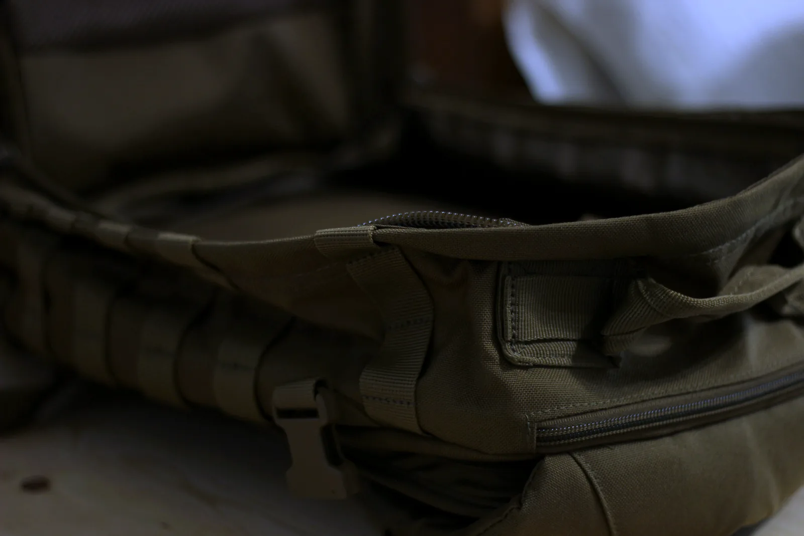 The main compartment of the RUSH 12 unzipped and open