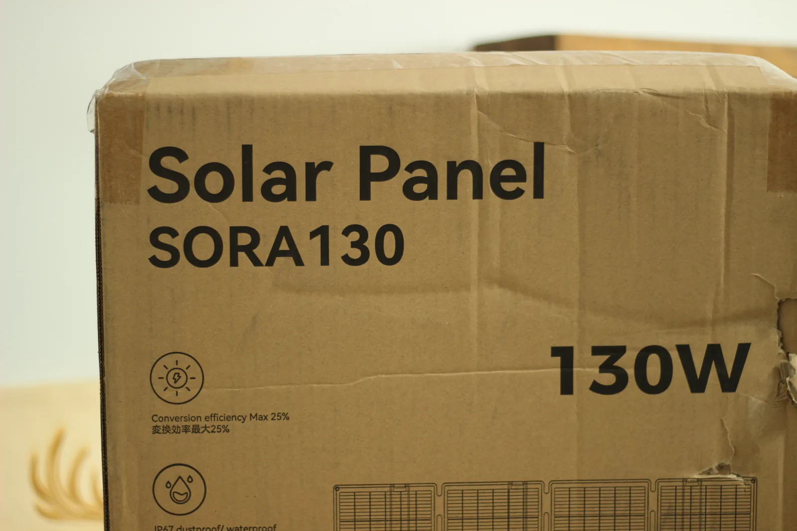 The shipping carton printed with Solar Panel, SORA130, and 130W in large type