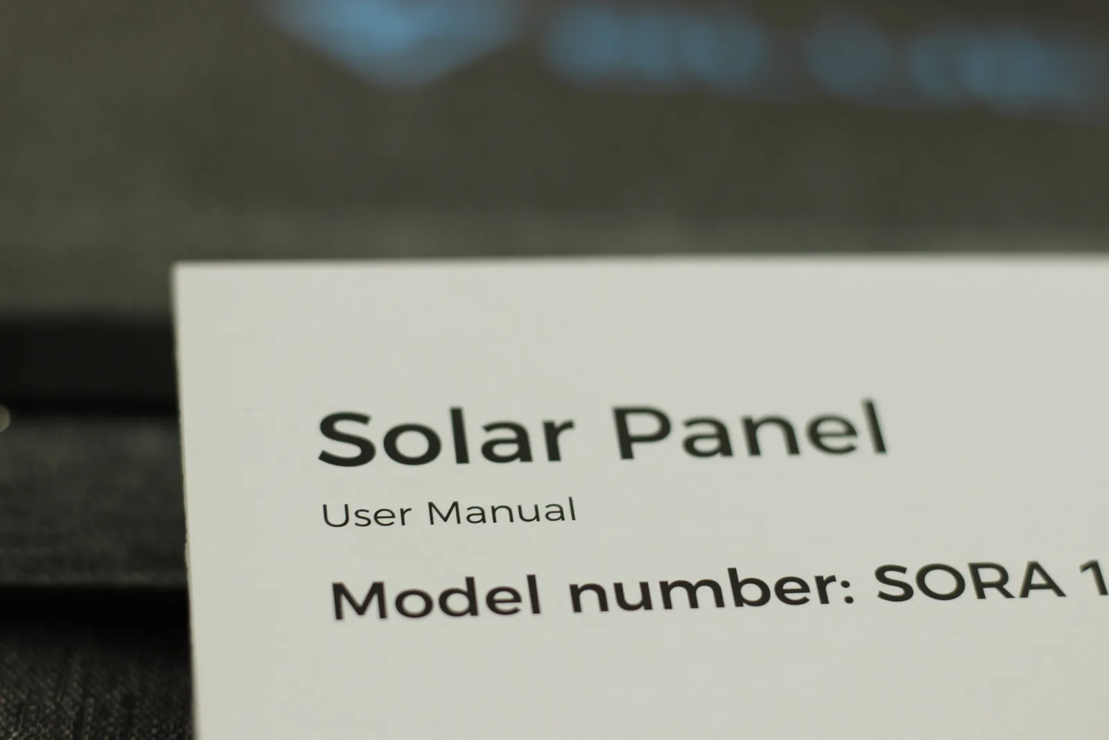 Close-up of the manual cover reading Solar Panel, User Manual, Model number SORA 1