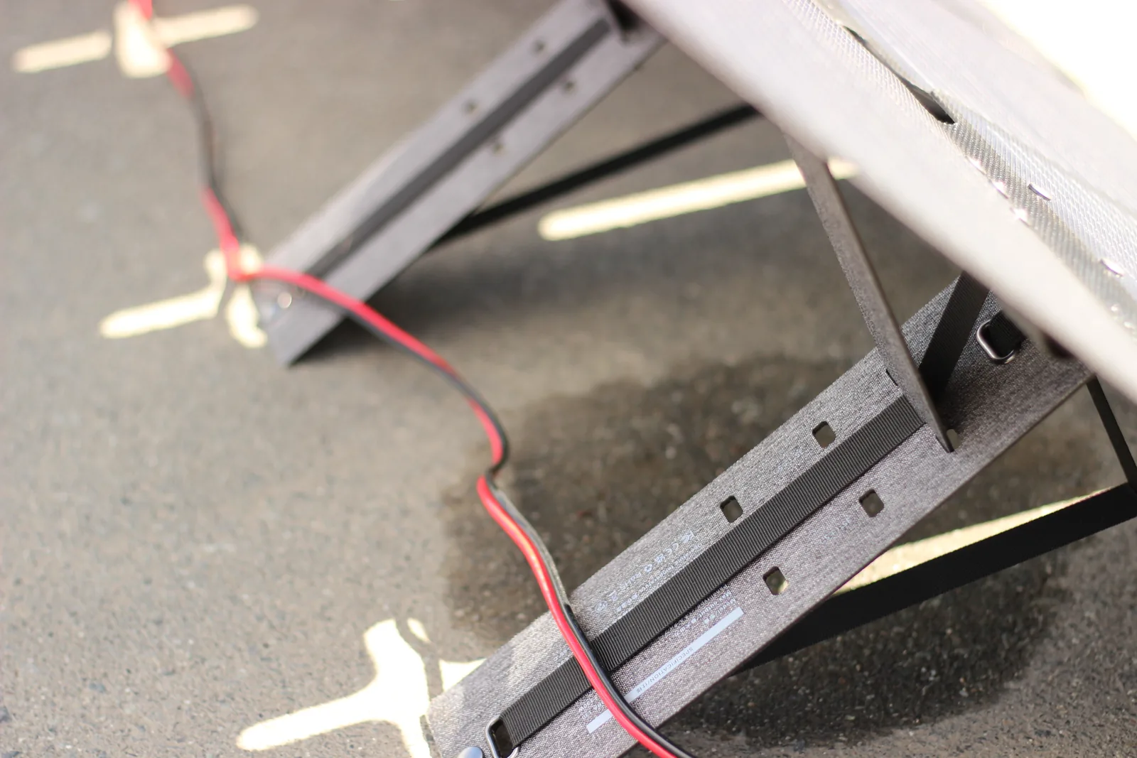 Close-up of the kickstand panel showing the row of slots that set the angle