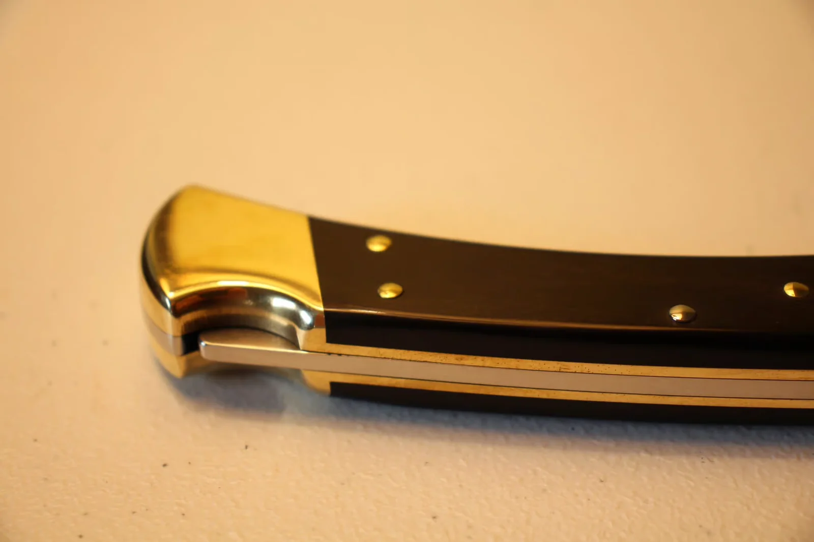 Closed Buck 110 from above showing the polished brass bolster and Buck stamp