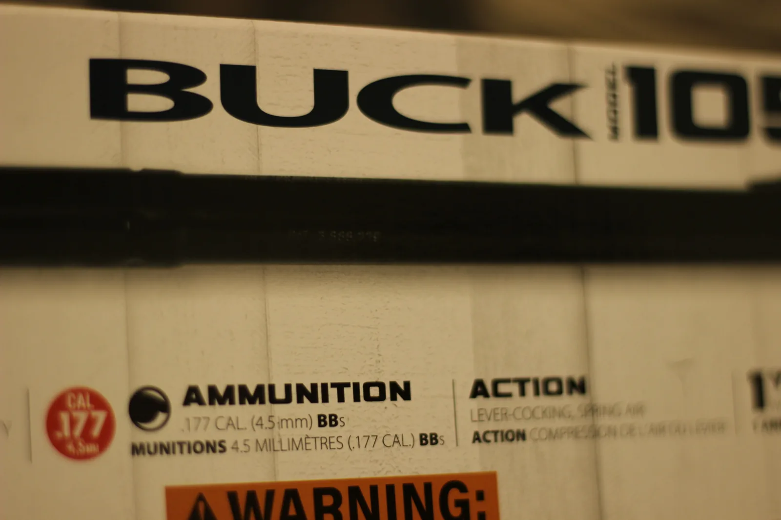 The Buck 105 fresh out of the box on a wood surface