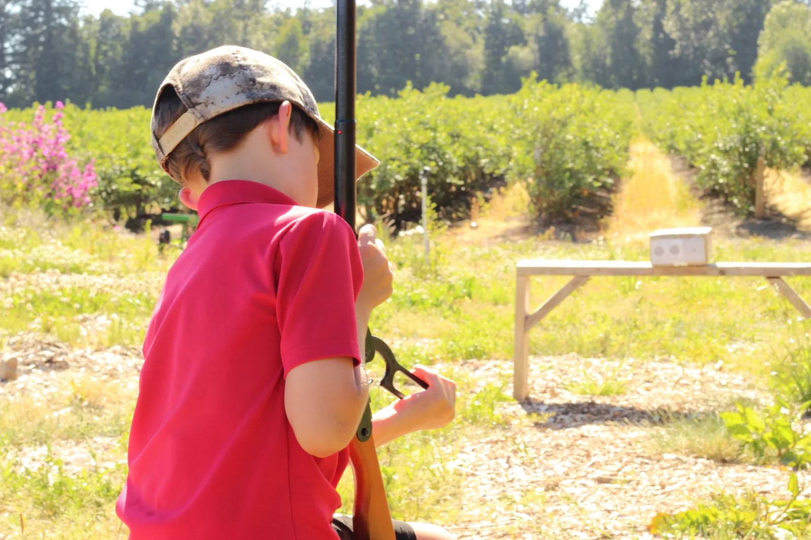 The young shooter aimed downrange at the target