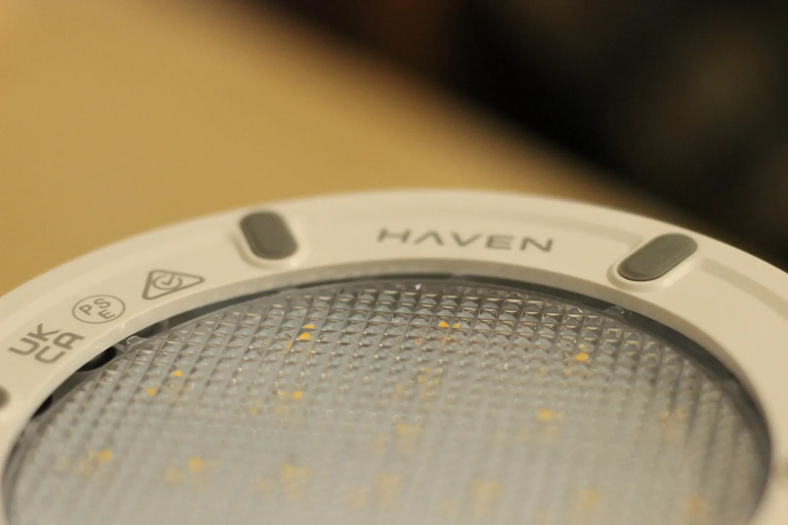 Close-up of the HAVEN 10000 underside showing the HAVEN brand mark and UKCA and PSE compliance markings