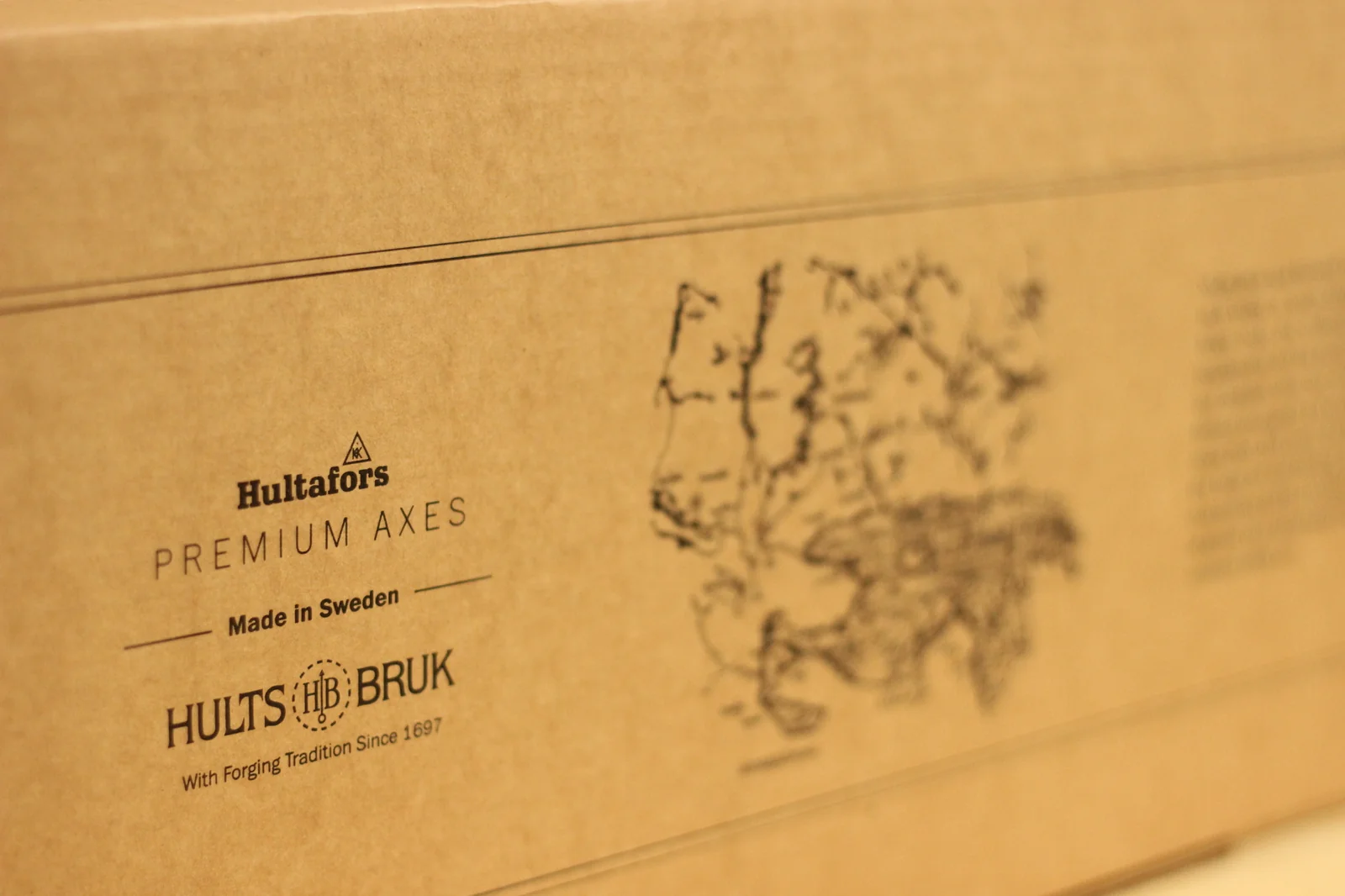Hultafors Premium Axes axe box with HULTS BRUK With Forging Tradition Since 1697 marking and an illustrated map of southern Sweden showing the Hult Valley location