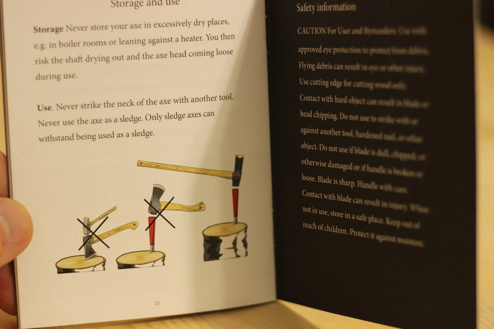 Two-page spread of the product booklet showing Storage and Use instructions on the left page including never store in dry places like boiler rooms and never use as a sledge with illustrated diagrams, and Safety Information on the right page
