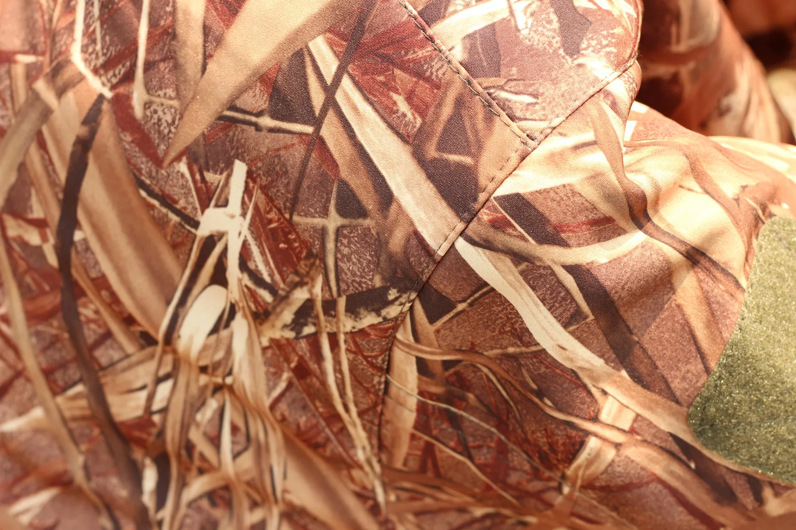 The NV Reeds print across the back of the jacket in daylight showing the full scale of the pattern