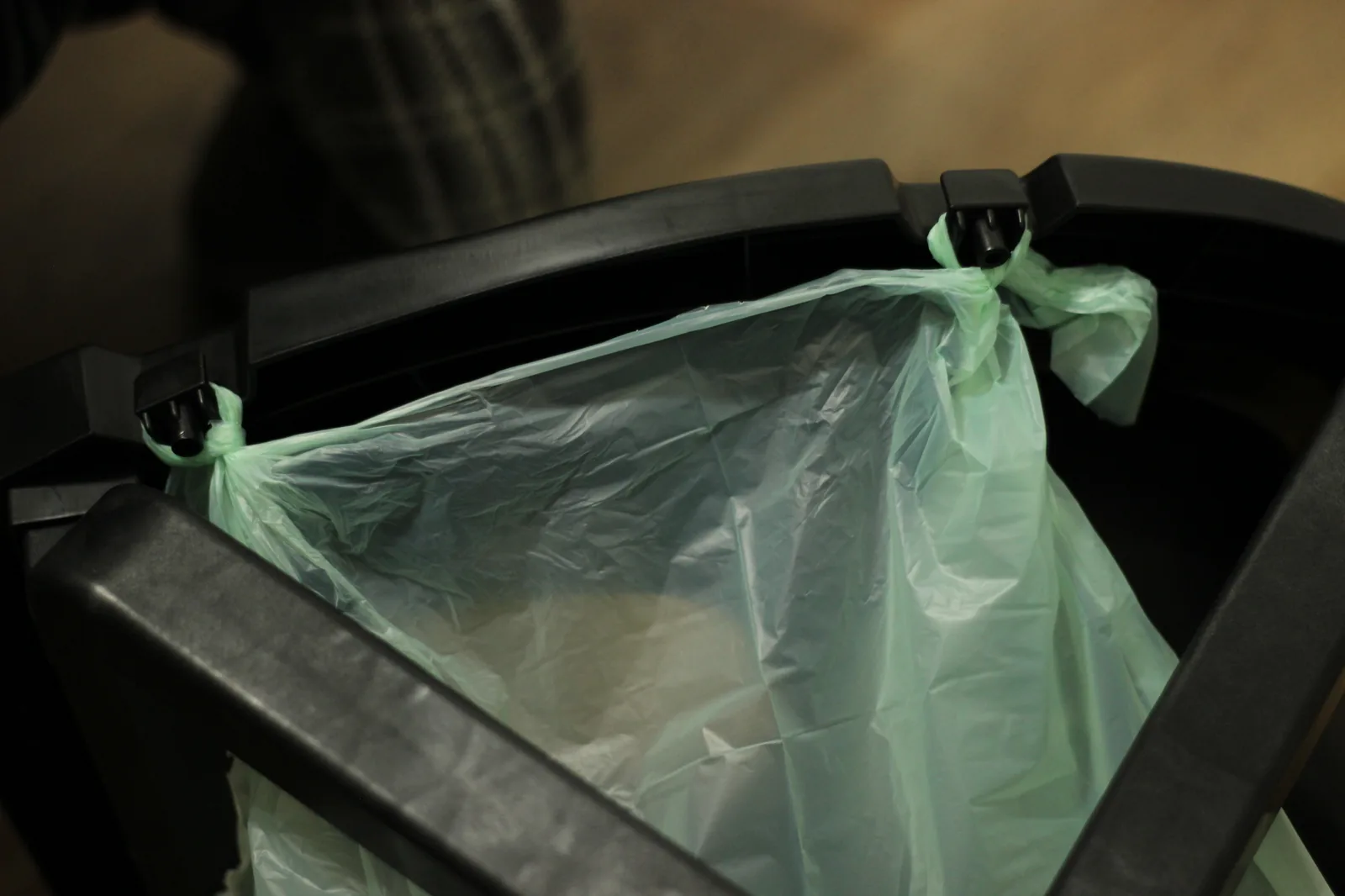 Compostable bag installed in the rear solids opening