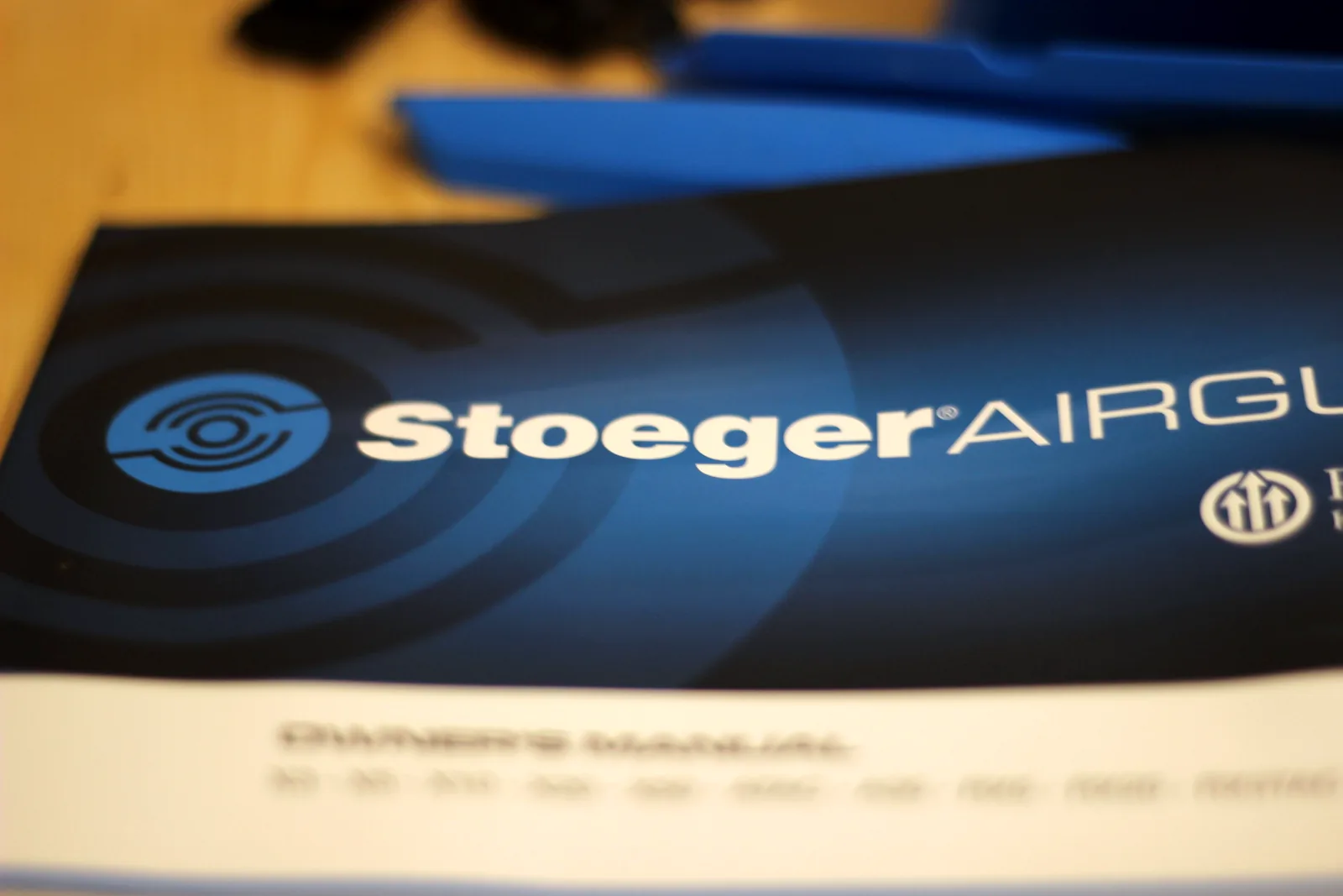 The Stoeger Airguns owner's manual with the Beretta Holding mark on the cover