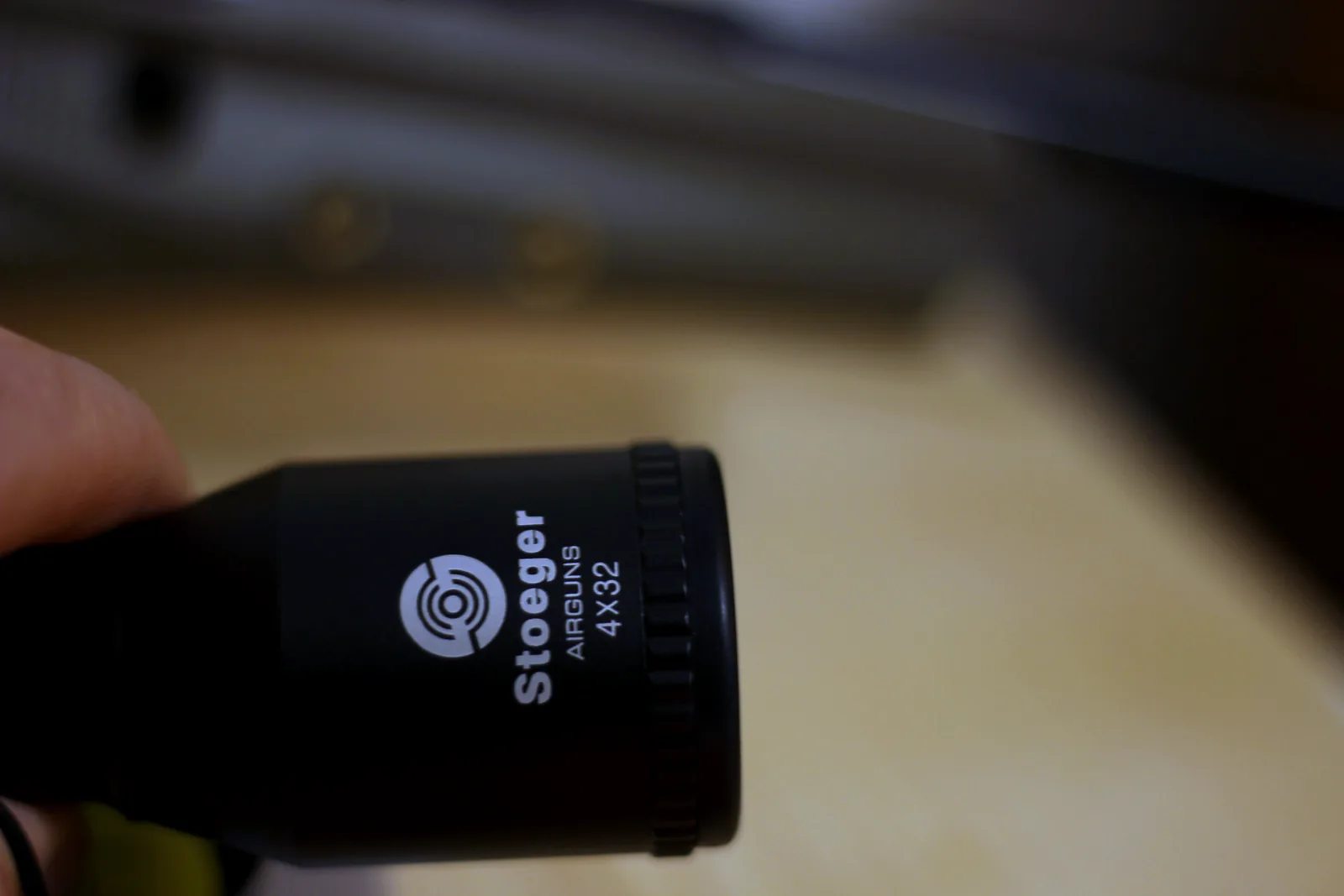 The Stoeger Airguns 4x32 marking on the scope tube