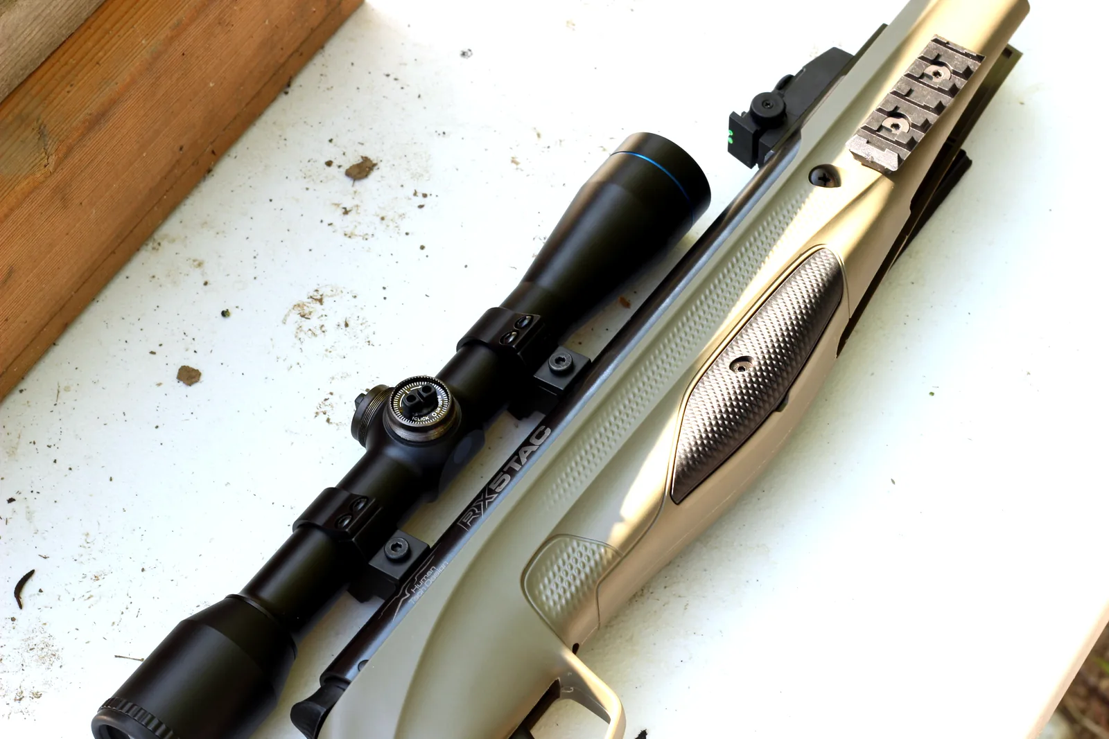 The scoped RX5 TAC lying on a bench ready to shoot