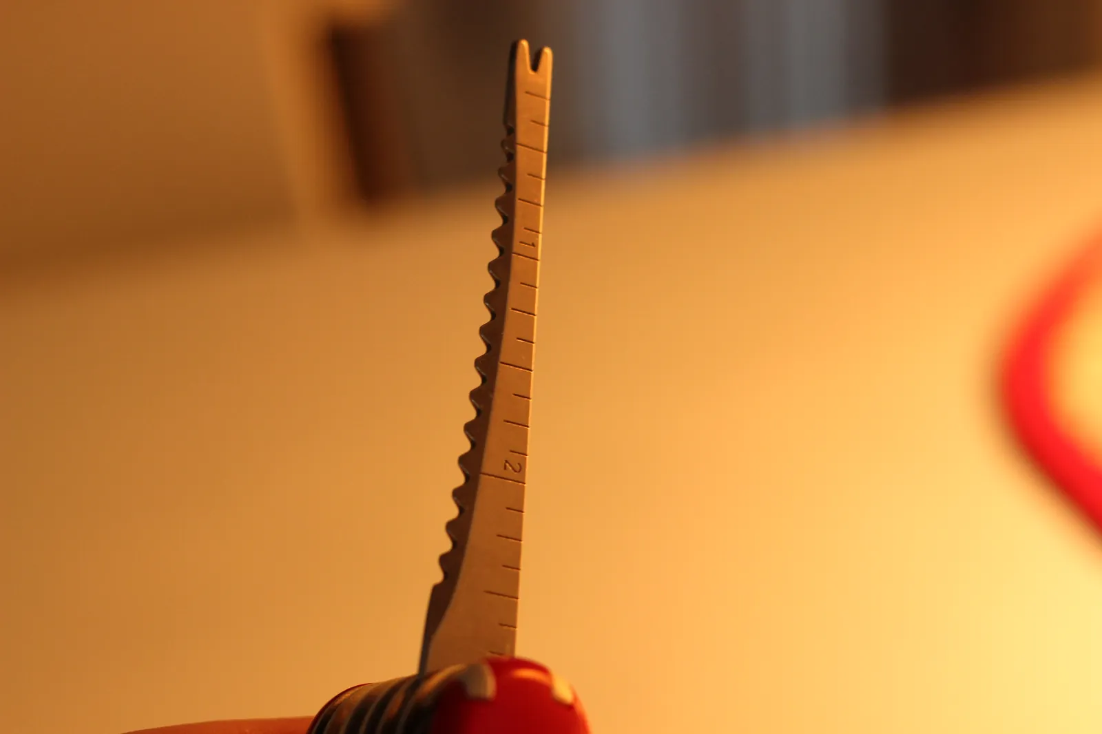 The SwissChamp scissors open and extended, showing the spring-loaded hinge and the sharp working edges