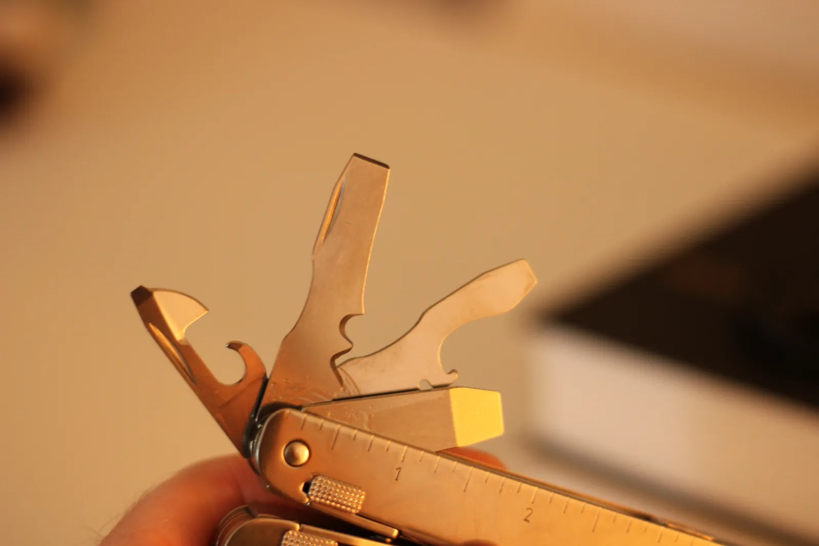The Swiss Tool MX Clip's large blade extended and locked in the open position showing the drop-point profile and the Victorinox stamp